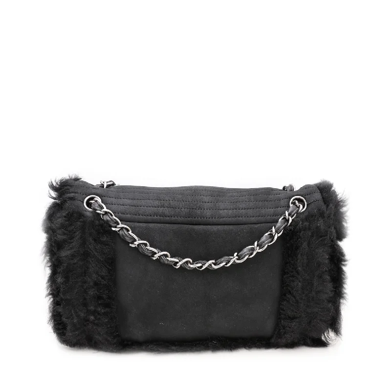 Best bags for photographersChanel Black CC Mouton Fur Flap Bag